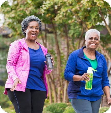 Two older women walking